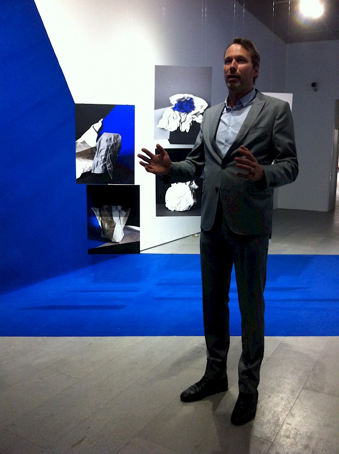Marcel Feil from FOAM explaining 'A Not So Still/life (Tabula Rasa)' in a round tour at Himalaya Museum in Shanghai.